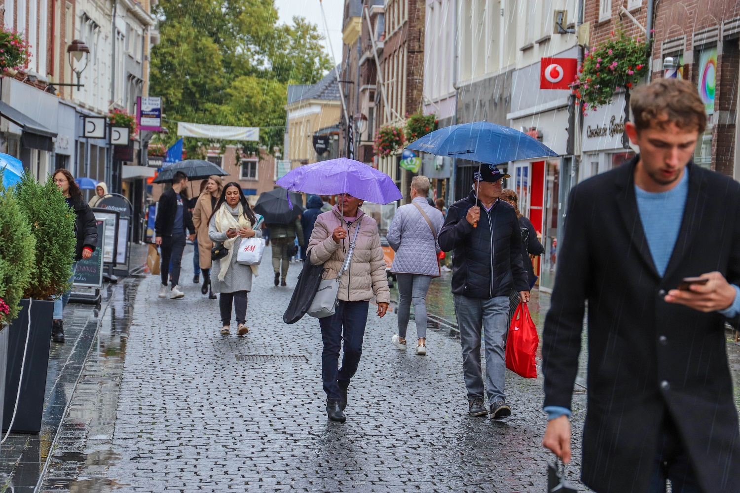 regen slecht weer stad winkelen