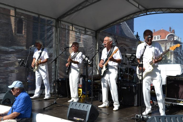 Local musicians performing at a small venue