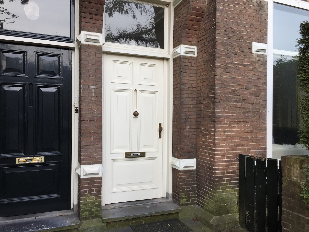 witte letter t huizen